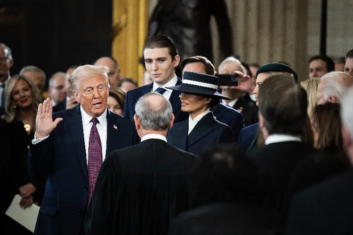 Donald Trump takes the oath of office as the 47th President of the United States in the U.S. Capitol Rotunda on January 20, 2025.