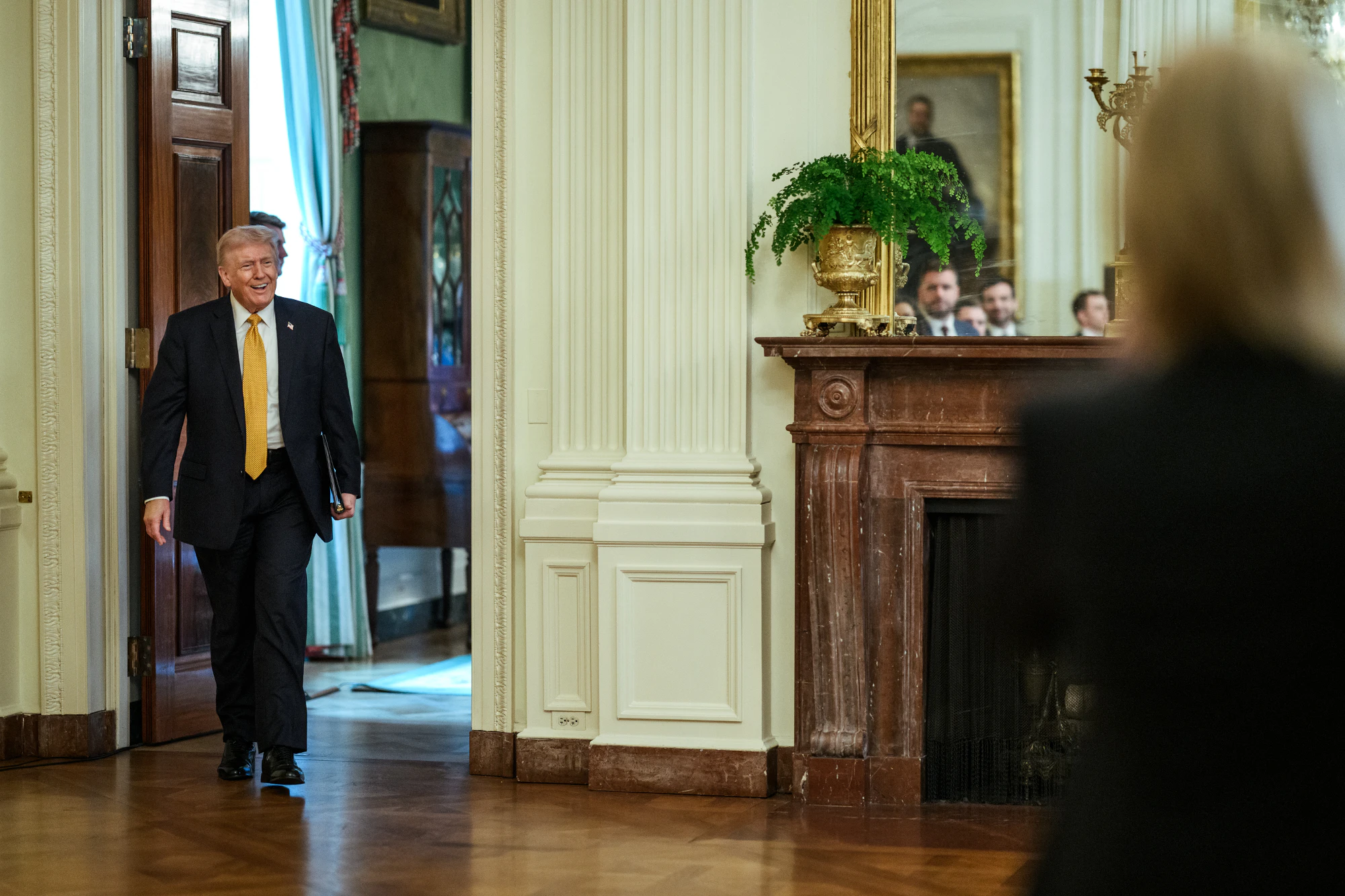 President Donald Trump meets with members of the Trump-Kennedy Center board during a luncheon in the East Room of the White House on March 16, 2026.